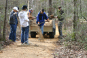 Volunteers work on arboretum trails